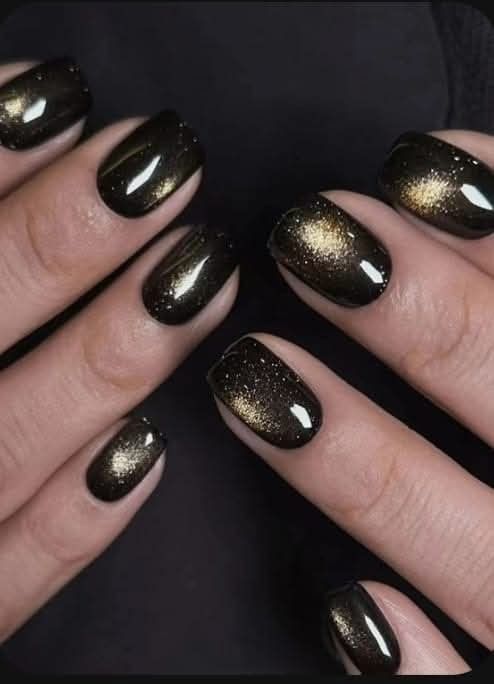 Black and Gold Cat Eye Nails